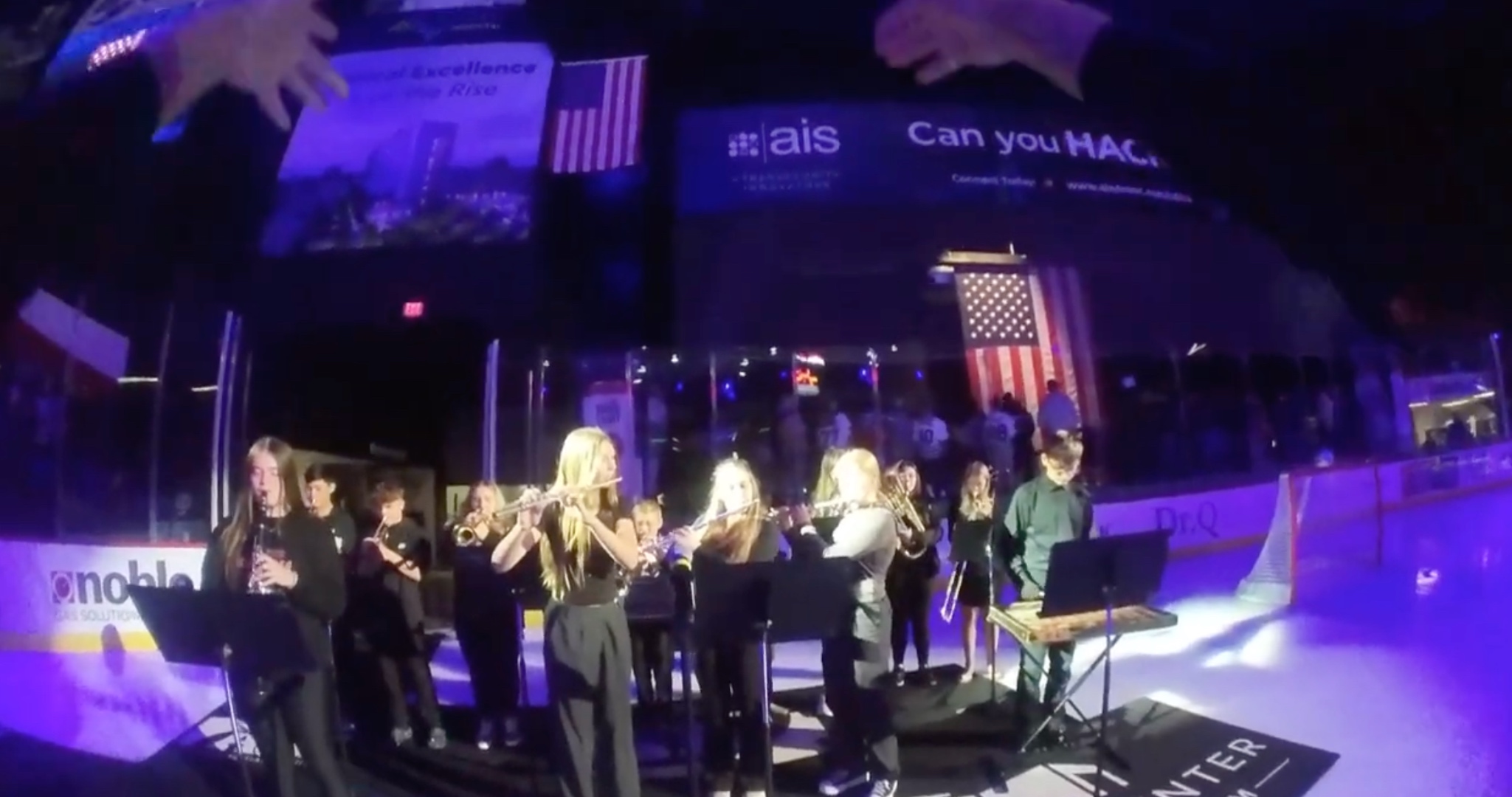 PCS band performing the National Anthem at a Utica Comets game