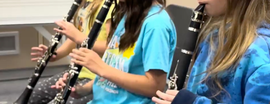 Beginning-band clarinet section playing together